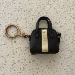 Kade Spade coin purse. will not fit cards in.the key holder is tarnished …